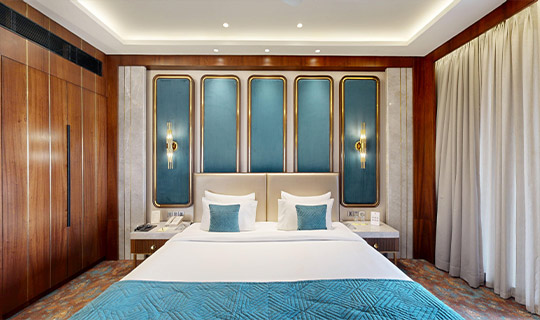 best room in Pune for stay at Corinthians Pune Resort & Club